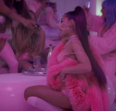 Ariana Grande twerking with her tongue out