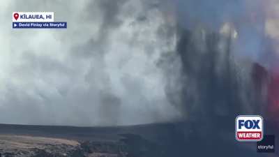 Tourists gaze at rare sight of "volnadoes" as they swirl around a volcanic eruption in Hawaii.