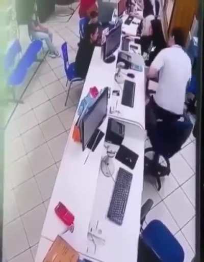 Office chair launches top half after man gets up. Date unknown