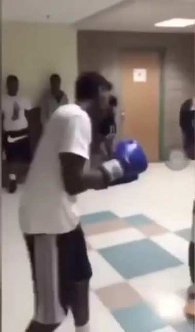Big dude spars boxer