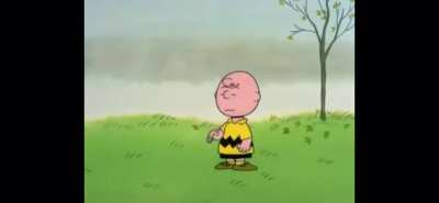 Charlie Brown tries to kick a football