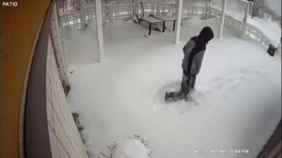 Guy walks to a restaurant in the snow just to find out that its closed