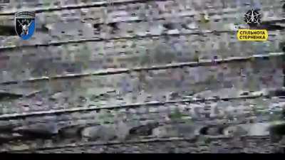 Footage showing drone operators of the Ukrainian 42nd Mechanized Brigade attacking a massive Russian "turtle" tank and infantry soldiers. Donetsk Oblast.