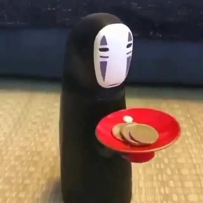 No-Face Piggy Bank