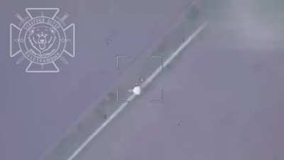 Ukraine truck transporting a tank hit by lancet drone. (Music from source)