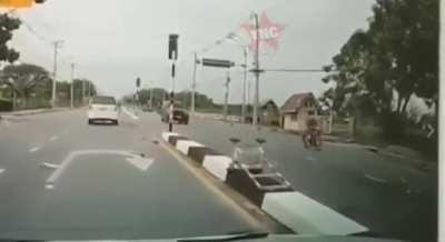 Motorcycle rider hits a car, goes flying and then gets run over by another car