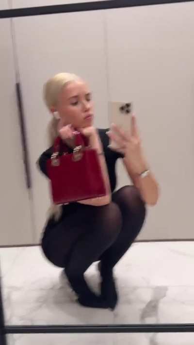 Polina in black outfit | IG April 2025