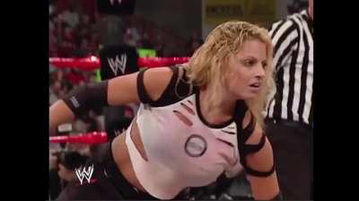 Nidia embarrasses Trish backstage and is later knocked out cold for her actions
