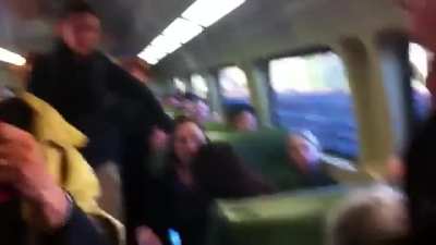 Racist woman kicks off on the the train and mocks an Asian passenger