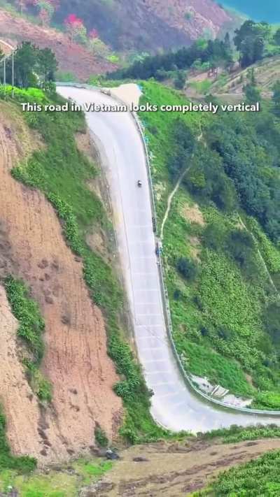 This road in Vietnam, but it's just an optical illusion