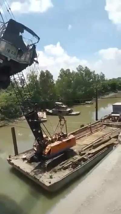 June 1st,2019 in Dong Thap , Viet Nam. The crane broke in two when "rescuing" the truck in the collapse of Tan Nghia bridge