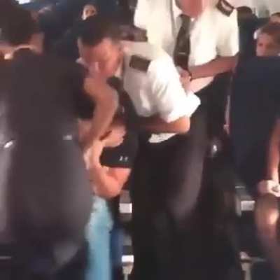 Apparently this is how the cabin crew trained to deal with disruptive passenger
