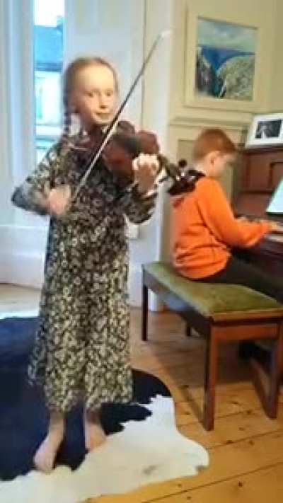 Saw this while scrolling Facebook: "April and Myles from The Southside Fiddlers in Glasgow..."