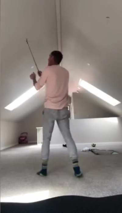 playing golf indoors