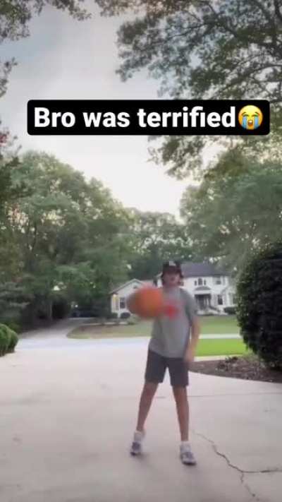 casually bouncing the ball