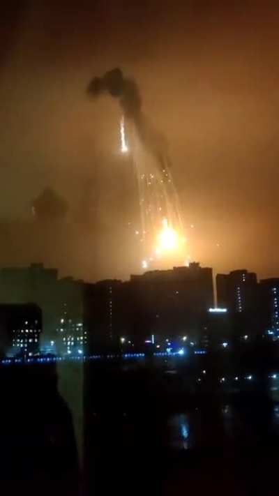 Another angle of the Russian plane being shot down over Kyiv
