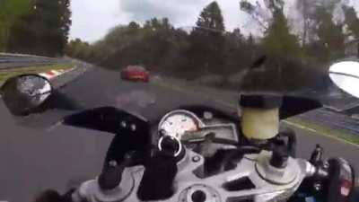 Motorcycle getting hit by car at 105 mph in N&uuml;rburgring
