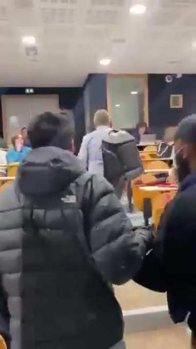 Protesters at University of Lyon in France take over a classroom and the professor storms out