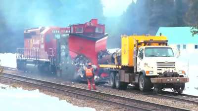 Jet Truck Melts Snow/Ice from Train's Plow