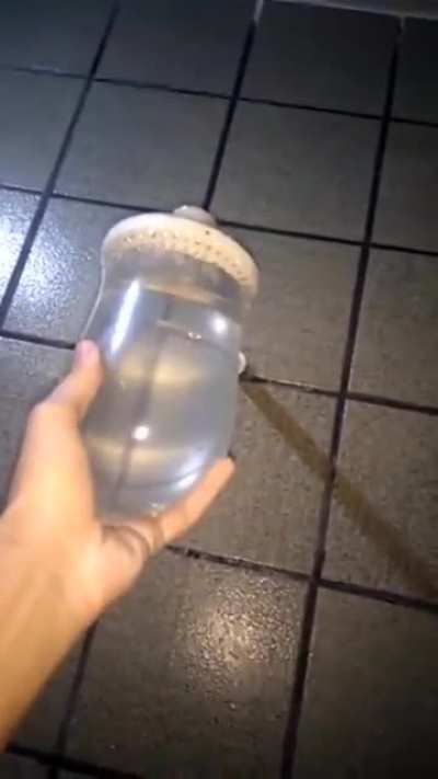 Wcgw putting a condom on a showerhead