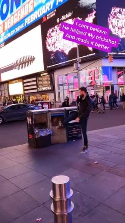 Stranger helps other guy make his trick shot even better.