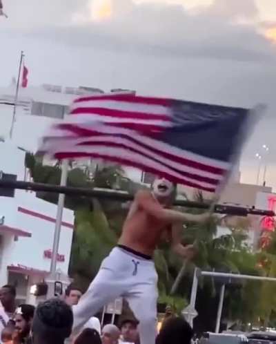 Paints face and hair like the Joker, goes to South Beach, climbs up on a car with an American flag, screams &ldquo;Fucking COVID is over baby!&rdquo; and makes it rain.