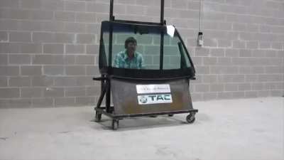CEO of Texas armored corporation demonstrates the quality of the glass that goes into his armored vehicles by sitting behind a window and taking rounds from an AK-47.