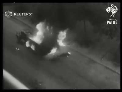 French resistance fighters set a German Wehrmacht truck aflame in Paris, 1944.