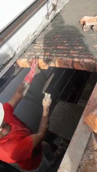 Brick laying on top of what? How is it staying put?