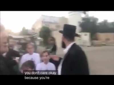 Robert Martin confronts Israeli settlers.
