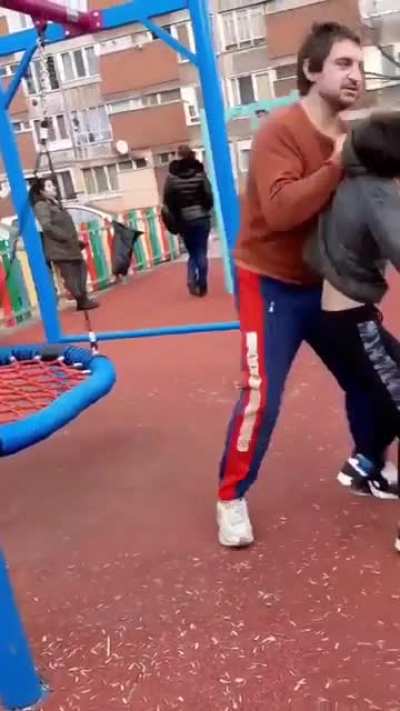 Crazed father throws a boy who was bullying his son to the ground.
