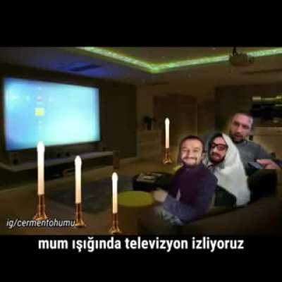 mum ışığında televizyon izliyoduk