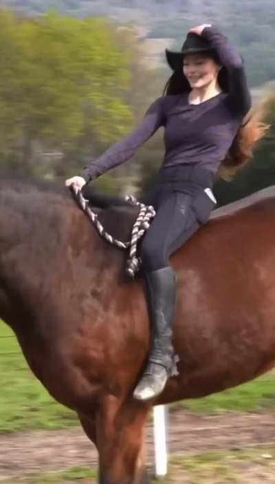 Mackenzie Foy riding