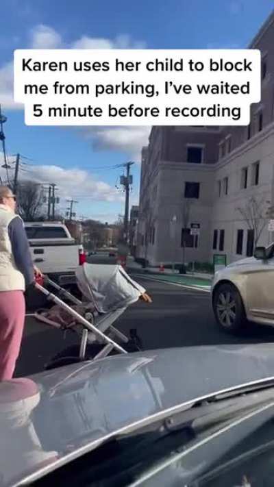 Holding a parking stop for an invisible car.