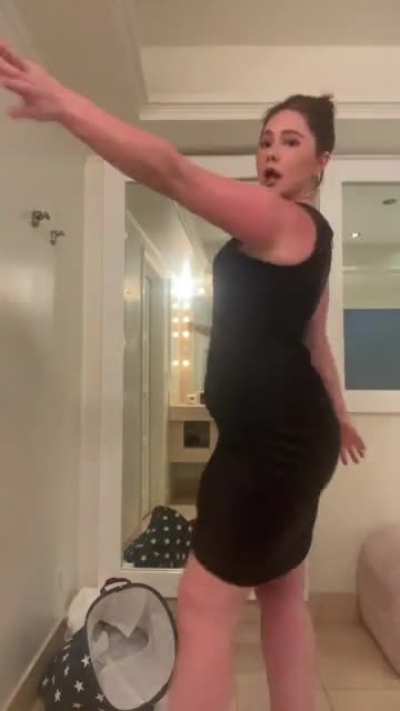 Emma looking damn fine in her black dress