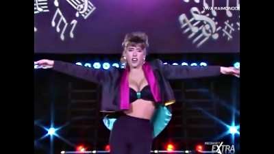 "Lady Marmalade" is a sultry music video featuring the iconic Italian singer and model Sabrina Salerno. Known for her stunning beauty and voluptuous figure, Sabrina puts on a captivating performance in this clip. The video showcases Sabrina's sensual danc
