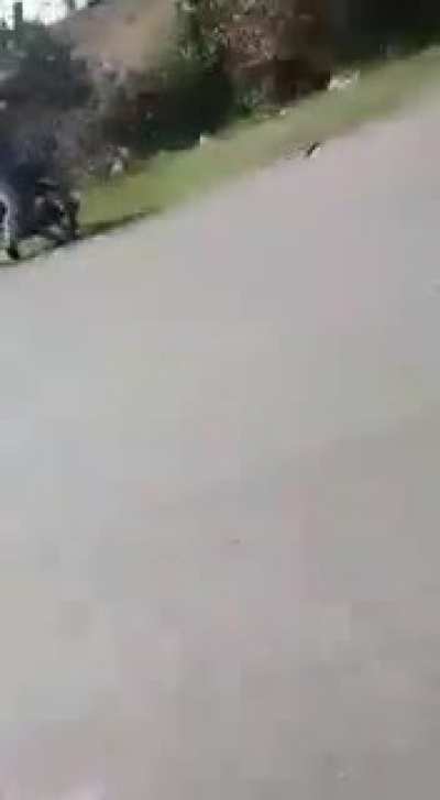 WCGW standing on a motorcycle