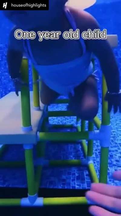 One year old child takes a quick dip