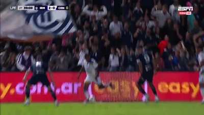 Fan throws a ball and it perfectly lands in from of a player who was already in motion to kick another ball