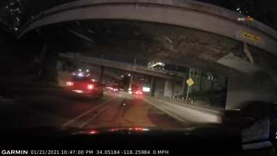 Car flies off a Freeway Bridge