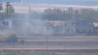 FSA BGM-71 TOW strike on a Syrian Tank exposed to fire - N. Hama Countryside - 9/18/2014