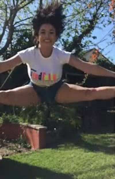 She&rsquo;s proud of her jump split and big titties!