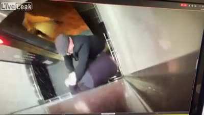 Douche Bag Gets Punched in the Mouth for Coughing on a Woman in an Elevator