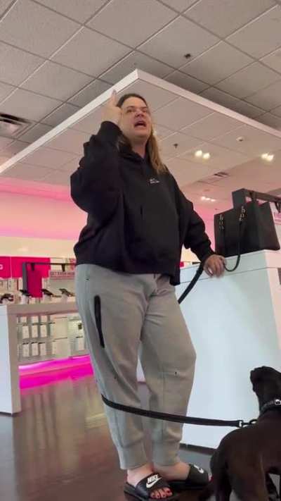 Lady trips out at T-Mobile