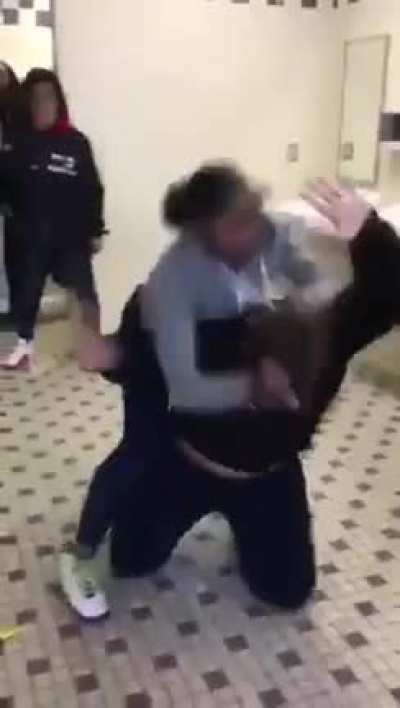 A girl asks bully to move 3 times, a fight ensues.