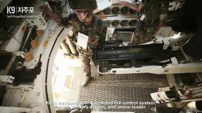 "What are you doing, step tank?" K10 ARV loads ammunition into a K9 Thunder SPH