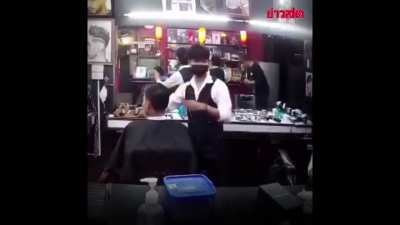 Russian man was upset with his haircut so he shaved a Thai Barber's head and fled the shop, Pattaya, Thailand.