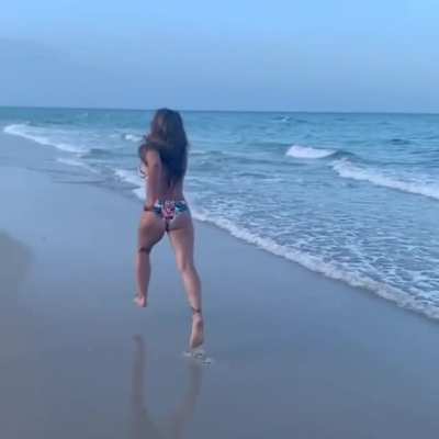 Mickie James running in bikini