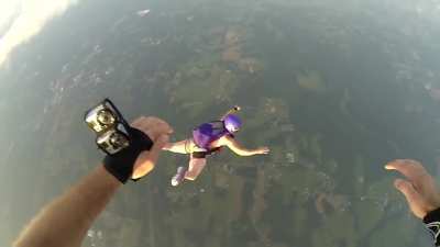 Maybe if she flaps fast enough she won't need the parachute