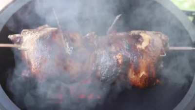 2 whole chickens on the Joetisserie using 2 apple wood chunks.